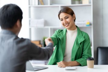 Business people shaking hands, finishing up meeting. business hand shake concept.