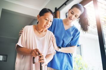 Walking stick, senior woman and nurse for home support, helping and kindness with retirement or nursing service. Medical student, doctor or caregiver and elderly patient with disability in healthcare.